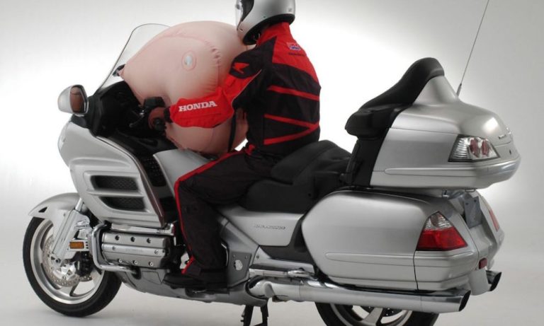 Honda patents fuel tank-mounted motorcycle airbag system